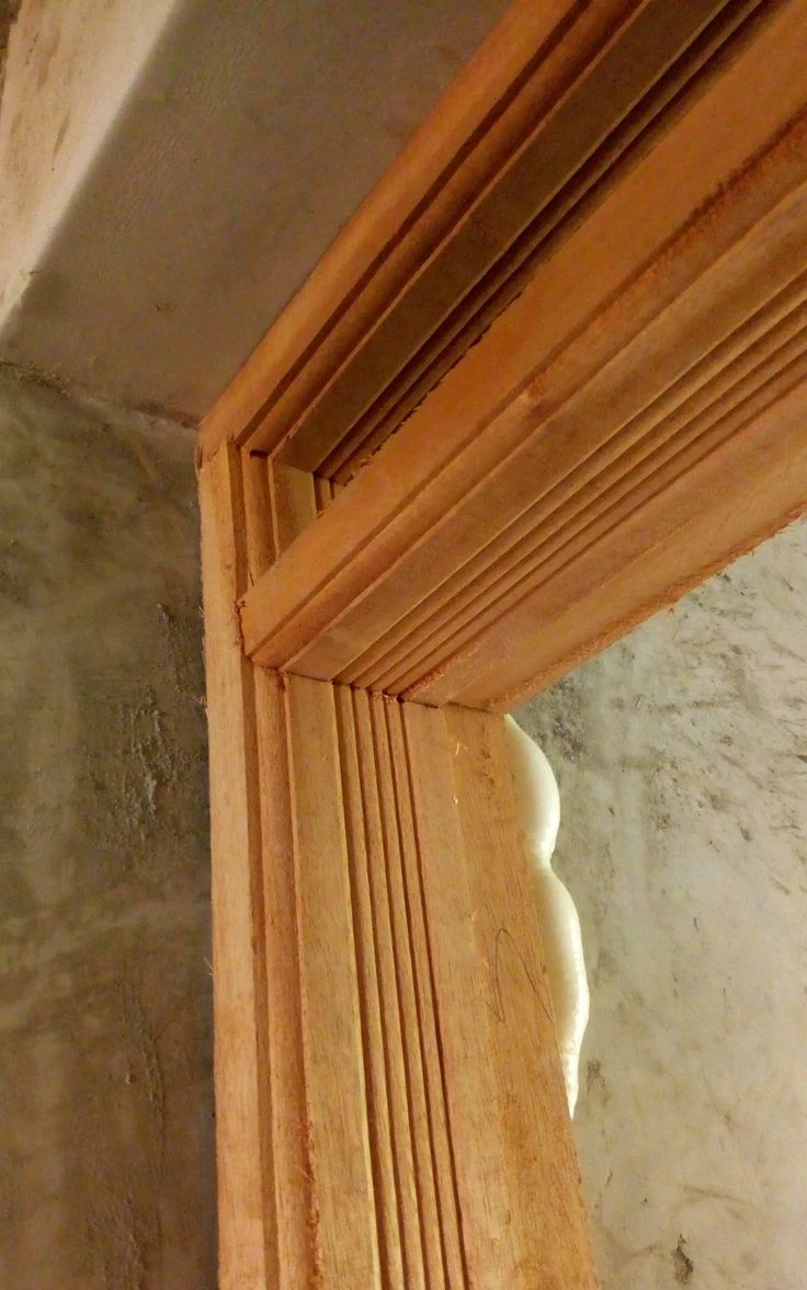 Solid timber door frame