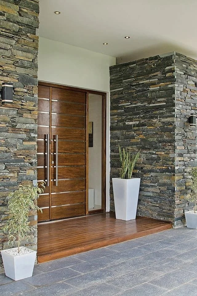 Stone cladding and timber entrance door